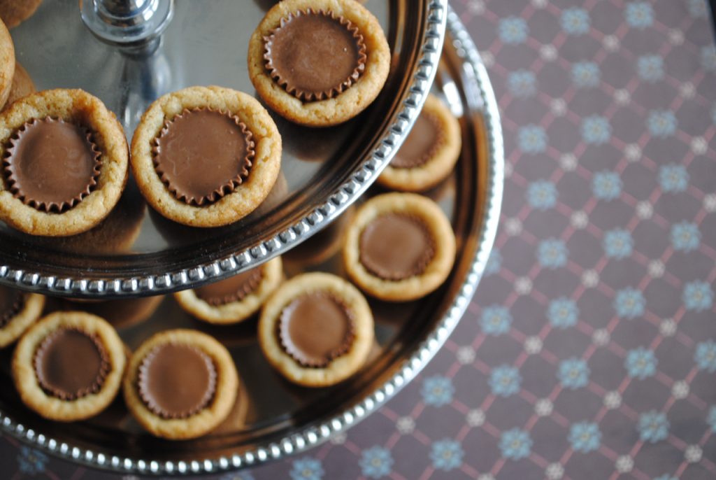 two tiered stand with peanut butter cup cookies