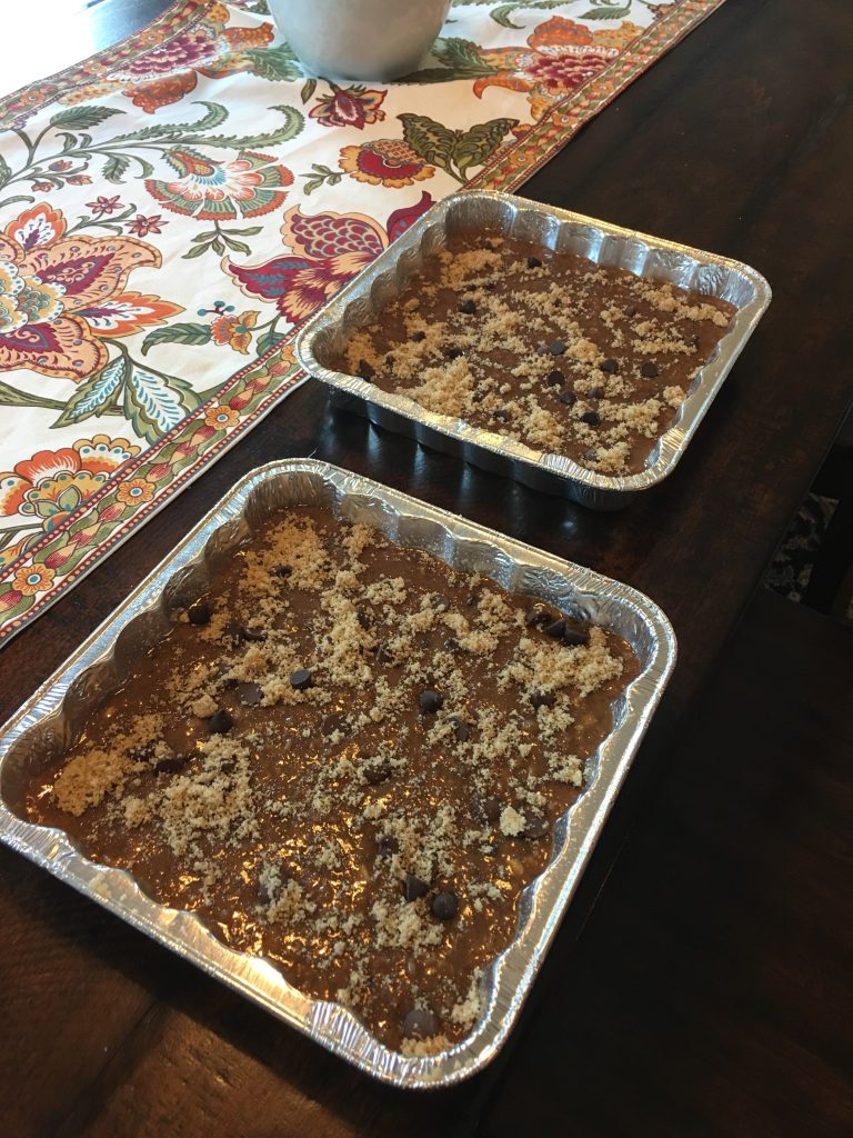Two pans of picnic cake ready to bake in the oven