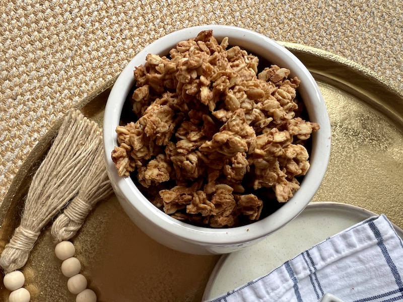 peanut butter granola in a white container