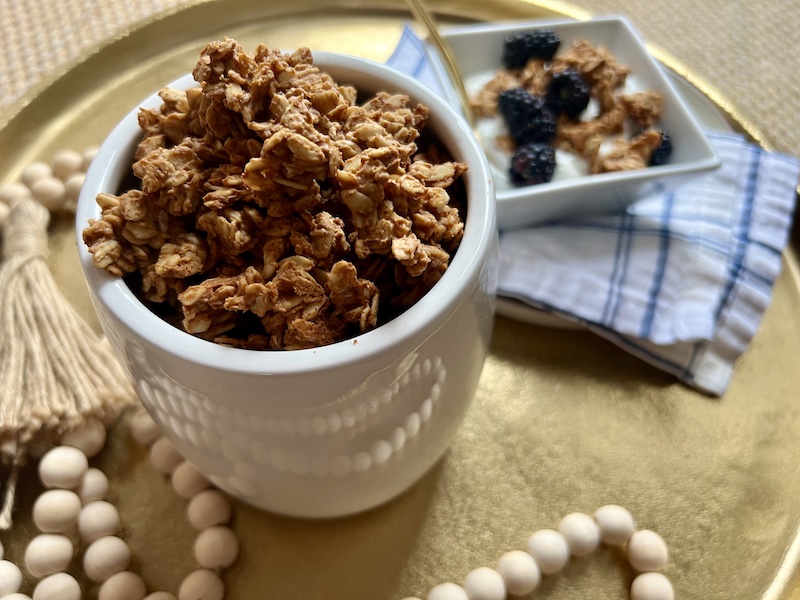 peanut butter granola in white container